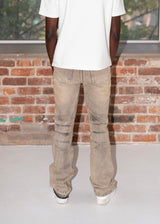 Stacked flared bronzer jeans